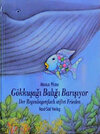 Buchcover Gökkusaǧi Baliǧi Bansiyor /Der Regenbogenfisch stiftet Frieden