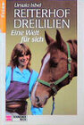 Buchcover Reiterhof Dreililien / Eine Welt für sich