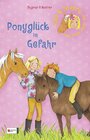 Buchcover Ellie & Möhre - Ein Pony packt aus, Band 04
