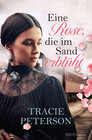 Buchcover Eine Rose, die im Sand erblüht